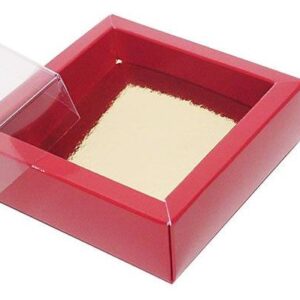 Punane kommikarp kuldse sisuga ja läbipaistva kaanega